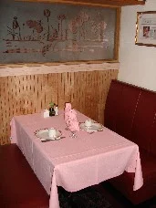 A set table in the Way Ho dining room